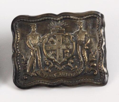 &lsquo;Advance Australia&rsquo;. Early exquisite Victorian embossed oblong brass belt buckle, with clasp and flat hook to back, featuring the Australian emblem to centre with a batsman and a bowler to either side with the wording &lsquo;Advance Australia&rsquo; beneath, decorati