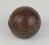 Cricket ball inkwell. Leather cricket ball ink well, well made with seam and stitched quarters. The ball is split and hinged and opens to reveal a brass liner with an original glass ink well. Approximately 2.5” circumference. Some wear to ball otherwise i - 3