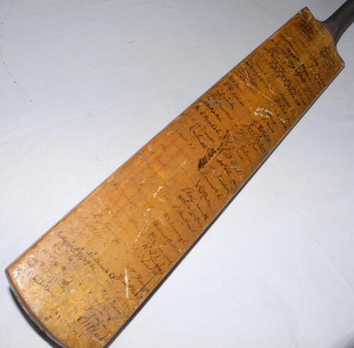 West Indies tour to England 1928. Full size &lsquo;Phil Mead [Bournemouth] Autograph&rsquo; bat signed in ink to the face by fourteen members of the West Indies touring party and profusely to the face and verso by counties. West Indies signatures are Nunes (Captain),