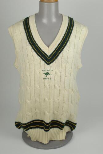 ‘Australian Youth XI’ sleeveless cricket sweater, by ‘Silver Fleece of Australia’, The sweater with trimming in Australian green and gold to neck and waist. Embroidered emblem of a running kangaroo and the wording ‘Australia Youth XI’ above and below in g