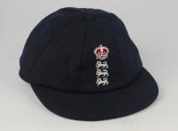 Adam Hollioake, Surrey & England. England navy blue cloth Test cap, by Michael of Chatham, with embroidered three lions and crown emblem of England to cap, worn by Hollioake during his Test career. Signed (worn) to inside label by Hollioake and given to t