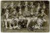 Australian tour of England 1921. Mono printed postcard of the Australian team 1921 with caption and players names printed to lower border. T. Bolland photographer. Signed by all sixteen members of the touring party including the Manager, Smith. Signatures