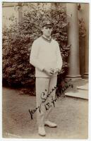 William James Whitty. New South Wales, South Australia & Australia 1907-1926. Excellent sepia real photograph postcard of Carkeek, full length, wearing Australian cap and holding a ball, taken on the 1912 Australian tour of England for the Triangular Seri