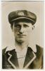 Clarrie Victor Grimmett. Victoria, South Australia & Australia 1918-1941. Mono real photograph postcard, head and shoulders, of Grimmett wearing South Australia cap. Nicely signed in ink by Grimmett. Biography printed to verso. Empire Publishing Co of the