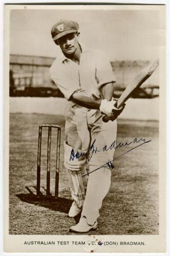 Donald George Bradman. New South Wales, South Australia & Australia 1927-1949. Mono real photograph postcard of Bradman batting at the wicket wearing South Australian cap. Title to lower border &lsquo;Australian Test Team d. (Don) Bradman&rsquo;. Signed to image by B