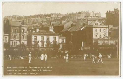 South of England v South Africa, Hastings 1904. Early sepia real photograph postcard of the tour match in progress showing the fall of the first wicket. Title to image &lsquo;Hastings Cricket Festival Sept 1904. South of England v South Africans. Fall of the fi