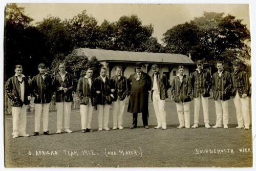 South Africa tour to England 1912. Mono real photograph postcard of the South Africa team standing on the pitch with the Mayor of Bournemouth, taken during the Bournemouth Cricket Week for the match Hampshire v South Africa, 2nd-4th September 1912. Bourne