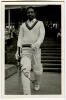 Carlos Bertram Clarke. Barbados, Northamptonshire, Essex and the West Indies 1937-1961. Mono real photograph postcard of Clarke walking down the steps to bat. Nicely signed in black ink by Clarke. Goodman of Newmarket postcard. Sold with a modern postcard