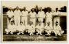 Lord Tennyson&rsquo;s tour of Jamaica 1931-32. Real photograph mono team postcard of the team standing and seated on the field at Kingston. Title to lower border, players names written to lower border. Players included Tennyson, Chapman, Stevens, Bowley, Valent