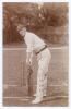 Arnold Warren. Derbyshire & England 1897-1920. Original sepia real photograph postcard of Warren standing full length in batting pose at the wicket wearing a Derbyshire cap. Foster of Brighton. Postally unused. A lovely image in very good condition.