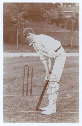 Reginald Binns Rickman. Derbyshire 1906-1911. Original mono real photograph postcard of Rickman standing full length at the wicket in batting pose and wearing cricket attire and Derbyshire cap. Blind embossed stamp for Foster of Brighton to lower right co