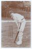 Reginald Binns Rickman. Derbyshire 1906-1911. Original mono real photograph postcard of Rickman standing full length at the wicket in batting pose and wearing cricket attire and Derbyshire cap. Blind embossed stamp for Foster of Brighton to lower right co