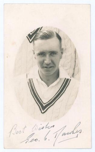 George Owen Dawkes. Leicestershire & Derbyshire 1937-1961. Original mono real photograph postcard of Dawkes head and shoulders in cameo wearing cricket attire and Leicestershire sweater. Nicely signed in ink to lower border &lsquo;Best wishes, Geo. O. Dawkes&rsquo;. 