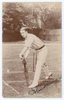 John William Henry Tyler ‘Johnny’ Douglas. Essex & England 1901-1928. Original mono real photograph postcard of Douglas full length in batting pose at the wicket. Very nicely signed in black ink to the photograph by Douglas. Hawkins & Co., Brighton. Posta