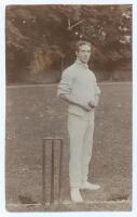 Ernest Richard Remnant. Hampshire & Europeans 1908-1922. Original sepia real photograph postcard of Remnant standing full length wearing cricket attire at the crease, holding a ball. Publisher unknown. Postally unused. The image with finger prints that ap