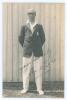 Albert Charles ‘Charlie’ Wright. Kent 1921-1931. Original sepia real photograph postcard of Wright standing full length wearing Kent cap and blazer. Very nicely signed to the image ‘Yours sincerely, Chas. Wright’. Blind embossed stamp for Nias of Brighton