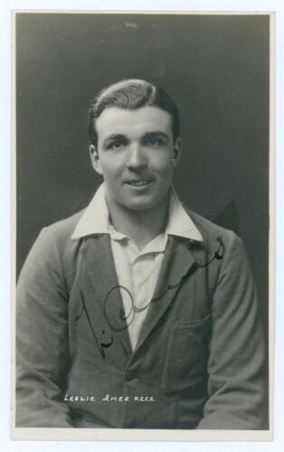 Leslie Ethelbert George Ames. Kent & England 1926-1951. Excellent original real photograph postcard of a studio portrait of Ames, half length, wearing cricket attire and blazer. Nicely signed in black ink to the image by Ames. B. & W. Fisk-Moore of Canter