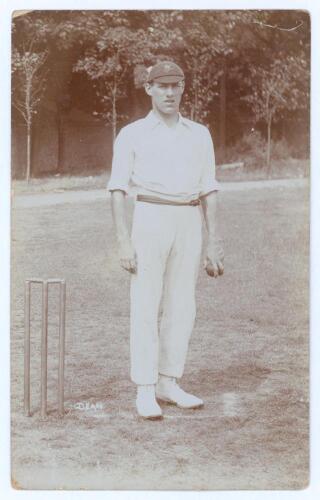 Harry Dean. Lancashire & England 1906-1912. Early sepia real photograph postcard of Dean standing full length at the wicket wearing cricket attire and Lancashire cap, ball in hand. Appears to be Foster of Brighton. Postally unused. Minor wear to corners, 