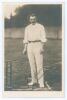 John Thomas Hearne. Middlesex & England 1888-1923. Early sepia real photograph postcard of Hearne standing full length at the wicket, wearing cricket attire, ball in hand. Nicely signed in black ink to the photograph by Hearne. Hartmann series no. F.H.L. 