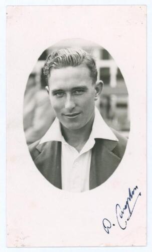 Denis Charles Scott Compton. Middlesex, Europeans & England 1936-1958. Original mono real photograph plain back postcard of a youthful Compton, head and shoulders in cameo wearing cricket attire and blazer. Nicely signed in ink by Compton to lower corner.