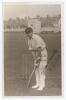 Frederick Ingram &lsquo;Fanny&rsquo; Walden. Northamptonshire 1910-1929. Mono real photograph postcard of Walden standing full length at the wicket in batting pose, wearing Northamptonshire cap. Signed in black ink to the photograph, Yours sincerely F. Walden. Blind 