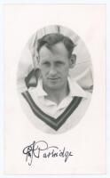 Reginald Joseph Partridge. Northamptonshire 1929-1948. Original mono real photograph postcard of Partridge, head and shoulders in cameo wearing cricket attire. Nicely signed in ink by Partridge to lower border. Official stamp for A. Wilkes & Son, West Bro