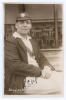Arthur Staples. Nottinghamshire 1924-1938. Early sepia real photograph postcard of Staples seated half length on pavilion steps, wearing Nottinghamshire cap and blazer. C.H. Richards of Nottingham. Nicely signed in ink to the photograph by Staples. Postal