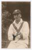 Joe Hardstaff junior. Nottinghamshire, Europeans, Auckland & England 1930-1955. Early sepia real photograph postcard of Hardstaff seated half length, wearing Nottinghamshire cap and cricket attire. C.H. Richards of Nottingham. Nicely signed in black ink t
