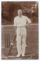 John Daniell. Somerset & Cambridge University 1898-1927. Early sepia real photograph postcard of Daniell (incorrectly titled ‘J. Daniels’) standing full length at the crease wearing batting attire and leaning on his bat. E. Hawkins & Co., Brighton. Postal