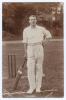 John Daniell. Somerset & Cambridge University 1898-1927. Early sepia real photograph postcard of Daniell (incorrectly titled &lsquo;J. Daniels&rsquo;) standing full length at the crease wearing batting attire and leaning on his bat. E. Hawkins & Co., Brighton. Postal