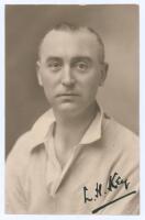 Laurence Henry Key. Somerset 1919-1922. Early sepia real photograph postcard of a studio portrait of Key, head and shoulders, wearing cricket attire. Nicely signed in black ink to the photograph by Key. Cyril Sledmere, Taunton. Adhesive marks to verso whe