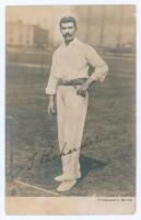 Thomas ‘Tom’ Richardson. Surrey, Somerset & England 1892-1905. Early sepia real photograph postcard of Richardson standing full length at the wicket, wearing cricket attire, Surrey cap and holding a ball. Nicely signed in black ink to the image by Richard