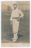 Thomas &lsquo;Tom&rsquo; Richardson. Surrey, Somerset & England 1892-1905. Early sepia real photograph postcard of Richardson standing full length at the wicket, wearing cricket attire, Surrey cap and holding a ball. Nicely signed in black ink to the image by Richard