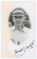 Donald John Knight. Surrey, Oxford University & England 1911-1937. Original mono real photograph postcard of Knight, head and shoulders in cameo wearing England sweater and hooped cap. Nicely signed in ink by Knight with typed title to lower border. Offic