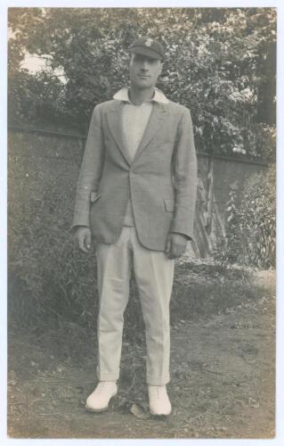 Edward William John &lsquo;Ted&rsquo; Brooks. Surrey 1925-1939. Original mono real photograph postcard of a youthful Brooks standing full length, wearing blazer and Surrey cap. Nias of Brighton with official stamp for A.G. Spalding & Bros., Brighton and Hove to verso