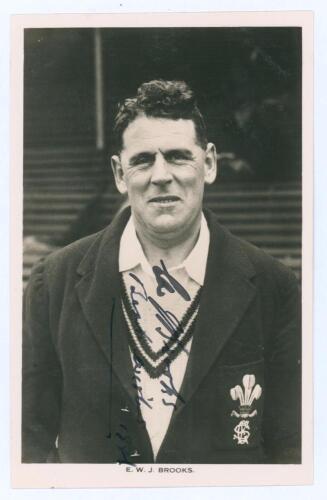 Edward William John &lsquo;Ted&rsquo; Brooks. Surrey 1925-1939. Original mono real photograph postcard of Brooks, later in his playing career, half length, wearing Surrey blazer. Signed in black ink to the image by Brooks. F.C. Dick, Oval Bookstall. Postally unused. 