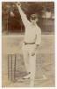 John Neville &lsquo;Jack&rsquo; Crawford. Surrey & England 1904-1921. Early sepia real photograph postcard of Crawford standing full length at the crease in bowling pose wearing Surrey cap. Appears to be by Foster of Brighton. Postally unused. Slight fading to the im