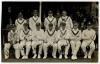 Sussex v Gloucestershire, Hove, May 1928. Mono real photograph postcard of the team, standing and seated in rows, with Captain, Arthur Gilligan to centre. The postcard signed by nine of the players featured, lacking the signatures of the two &lsquo;gentlemen cr