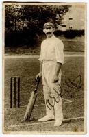 Albert Edward Relf. Sussex & England 1900-1921. Mono printed postcard of Relf, full length, in batting pose at the wicket. Nicely signed by Relf to image in black ink. Series unknown. Postally used and dated 1904. Some adhesive marks to verso, odd minor f