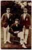 &lsquo;The Relf Bros&rsquo;. Fine real photograph postcard showing the three Relf brothers who played for Sussex in the early part of the century. Standing are Albert Relf (1900-21) and Robert (Bob) Relf (1905-24) and seated is Ernest Relf (1912-14). All three wearin