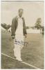 Hugh Tryon Bartlett. Sussex 1937-1949. Mono real photograph postcard of Bartlett, full length,wearing striped blazer on the field. Signed in black ink by Barlett. Publisher unknown. Good condition