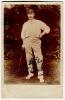 Arthur Frederick Augustus ‘Dick’ Lilley. Warwickshire, London County & England 1894-1911. Sepia real photograph postcard of Lilley, full length wearing club cap, in cricket attire holding bat to side. Boldly signed in black ink by Lilley to image. Rapid 