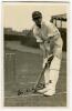 Robert Elliott Storey ‘Bob’ Wyatt. Warwickshire, Worcestershire & England 1923-1957. Mono real photograph postcard of Wyatt, full length, wearing Warwickshire cap, and in batting pose at the wicket. Nicely signed in black ink by Wyatt. The signature appea