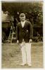 Wilfred Rhodes. Yorkshire & England 1898-1930. Excellent sepia real photograph postcard of Rhodes, full length, wearing Yorkshire cap and looking straight into the camera lens. Signed in blue ink by Rhodes. Two stamps to back of the postcard, one Bailey, 