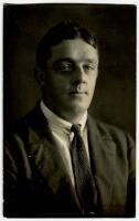 Arthur Dolphin. Yorkshire & England 1905-1927. Mono real photograph postcard of Dolphin, head and shoulders, wear jacket and tie. The photograph by famous Sydney photographer, May Moore, probaly on the M.C.C. tour of Australia 1920/21. Some silvering to 