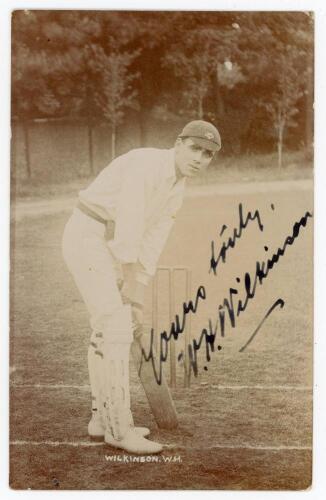 William Herbert Wilkinson. Yorkshire 1903-1910. Early sepia real photograph postcard of Wilkinson standing full length in batting pose at the crease. Nicely and boldly signed in black ink to the photograph by Wilkinson. Foster of Brighton. Dated to verso 