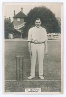 William Bestwick. Derbyshire 1898-1925. Phillips ‘Pinnace’ premium issue cabinet size mono real photograph trade card of Bestwick, standing full length at the crease wearing cricket attire with ball in hand. No. 85.C. 4”x6”. Plain back. A rarer card in th