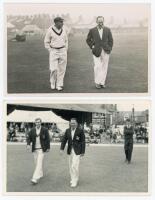 Don Bradman 1948. Mono real photograph plain back postcard of the captains, Bradman and R.W.V. Robins, walking off the field for the match H.D.G. Leveson-Gower’s XI v Australians at Scarborough, 8th- 10th September 1948. Official stamp to verso for Walker