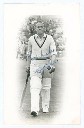 Willie Watson. Yorkshire, Leicestershire & England 1939-1964. Mono real photograph plainback postcard of Watson, full length walking out to bat, in cameo. Nicely signed in blue ink by Watson to front. Official stamp to verso for Walkers Studios, Scarborou