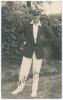 Edward Henry &lsquo;Ted&rsquo; Bowley. Sussex, Auckland & England 1912-1934. Original sepia real photograph postcard of Bowley standing full length wearing cricket attire, blazer and Sussex cap. Very nicely signed in black ink to the photograph. Blind embossed stamp 